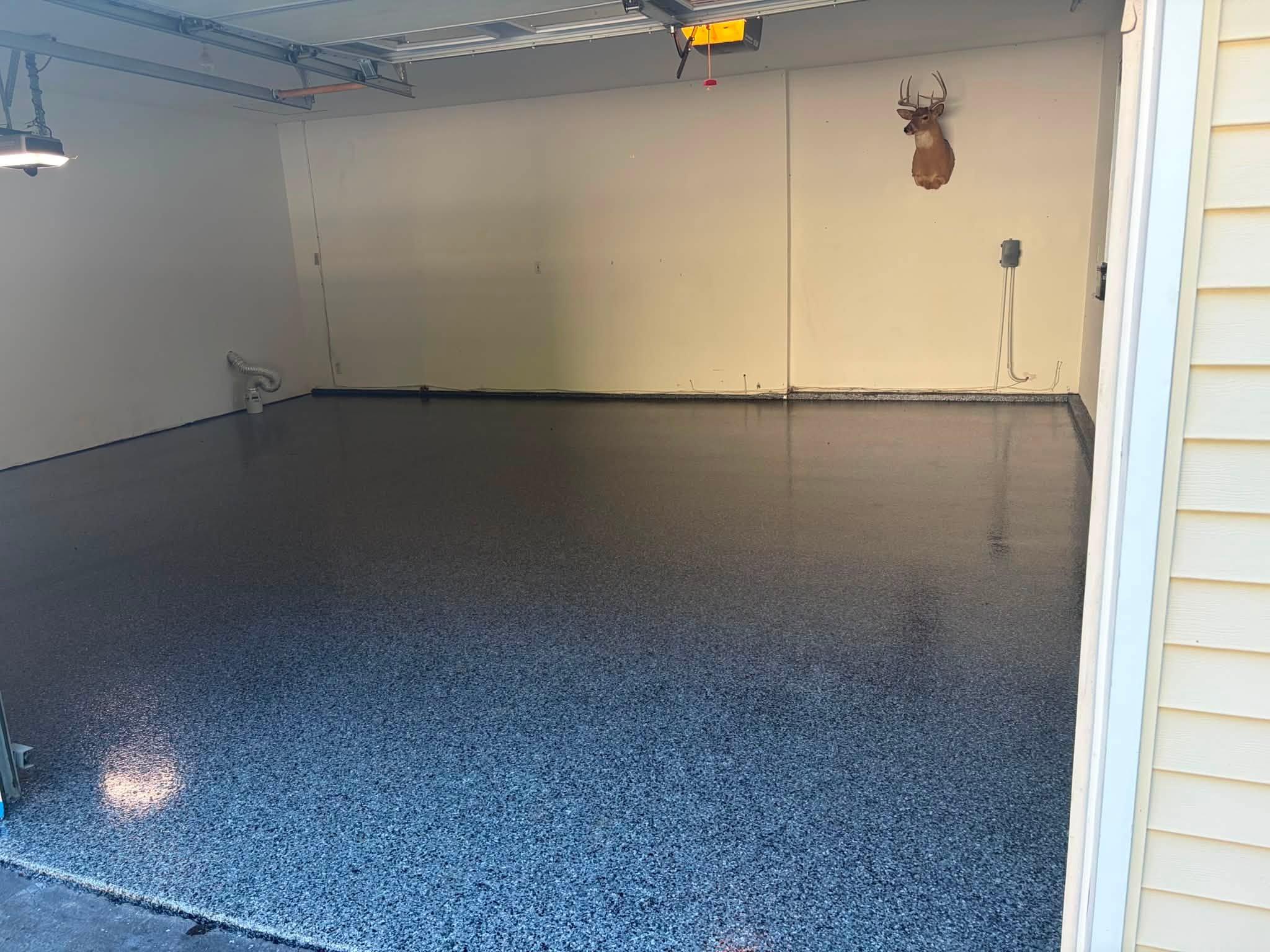 Finished epoxy coated garage floor after professional installation