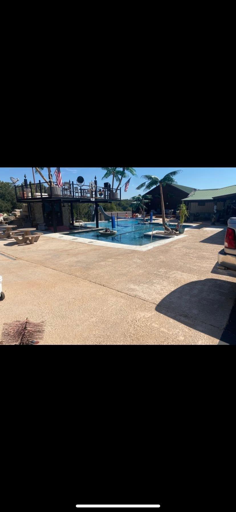 Worn concrete floor surface before coating at a commercial waterpark project