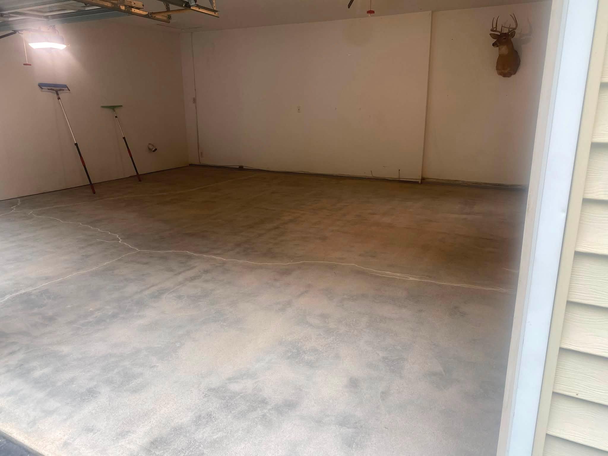 K.A.I. Coating crew applying floor coating during the installation process