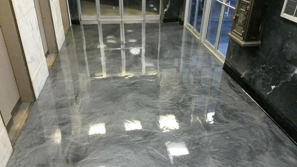 Graphite metallic epoxy floor with smoke-screen marble effect
