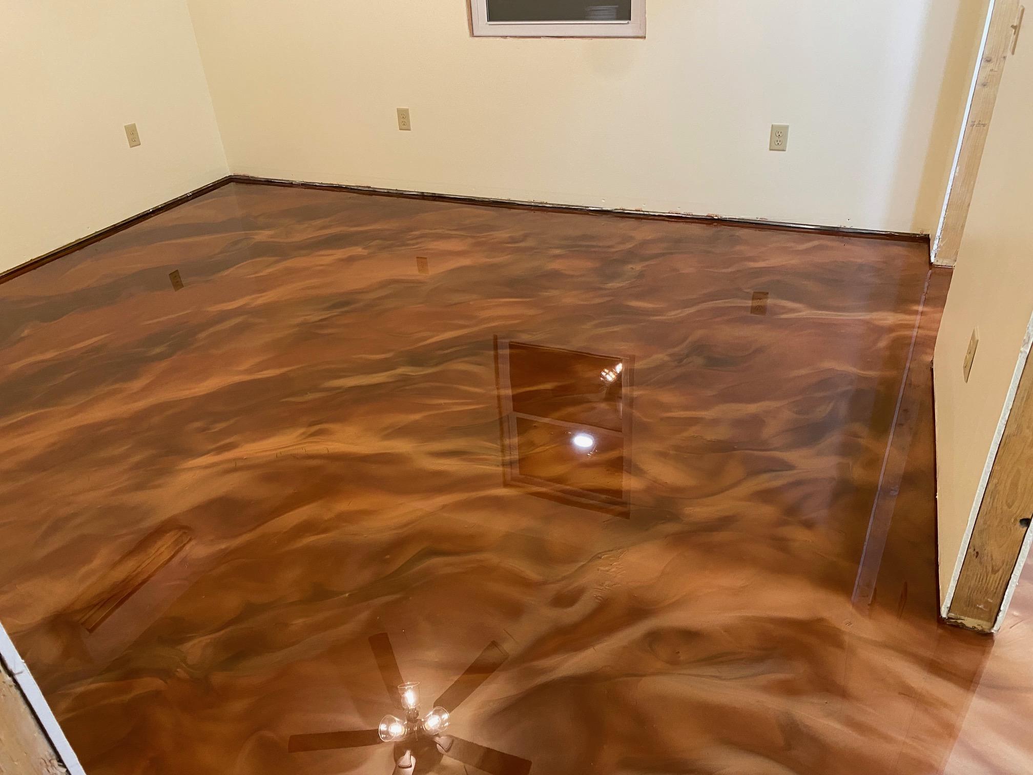 Bedroom with finished high-gloss metallic epoxy floor